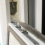 Integral brake fitted to our tilt back secondary glazing.